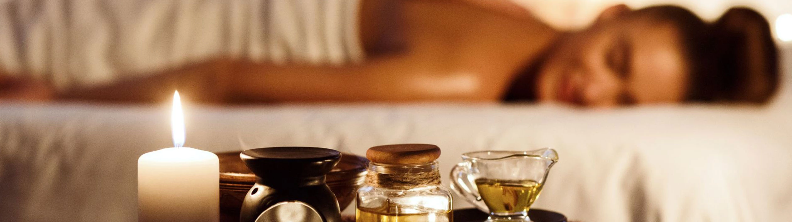 Relaxing spa treatment with candles and essential oils at Le Palmiste Hotel in Mauritius